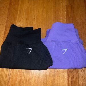 GYMSHARK BLACK AND PURPLE SHORTS